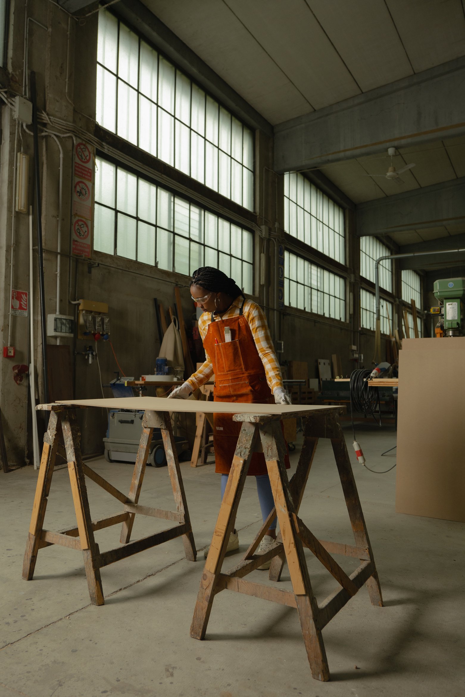 Woman Working at Woodworking Studio